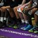 Pioneer High School basketball players show off their colorful shoes while on the bench during the fourth quarter at Pioneer on Tuesday, Feb. 19, 2013. Melanie Maxwell I AnnArbor.com